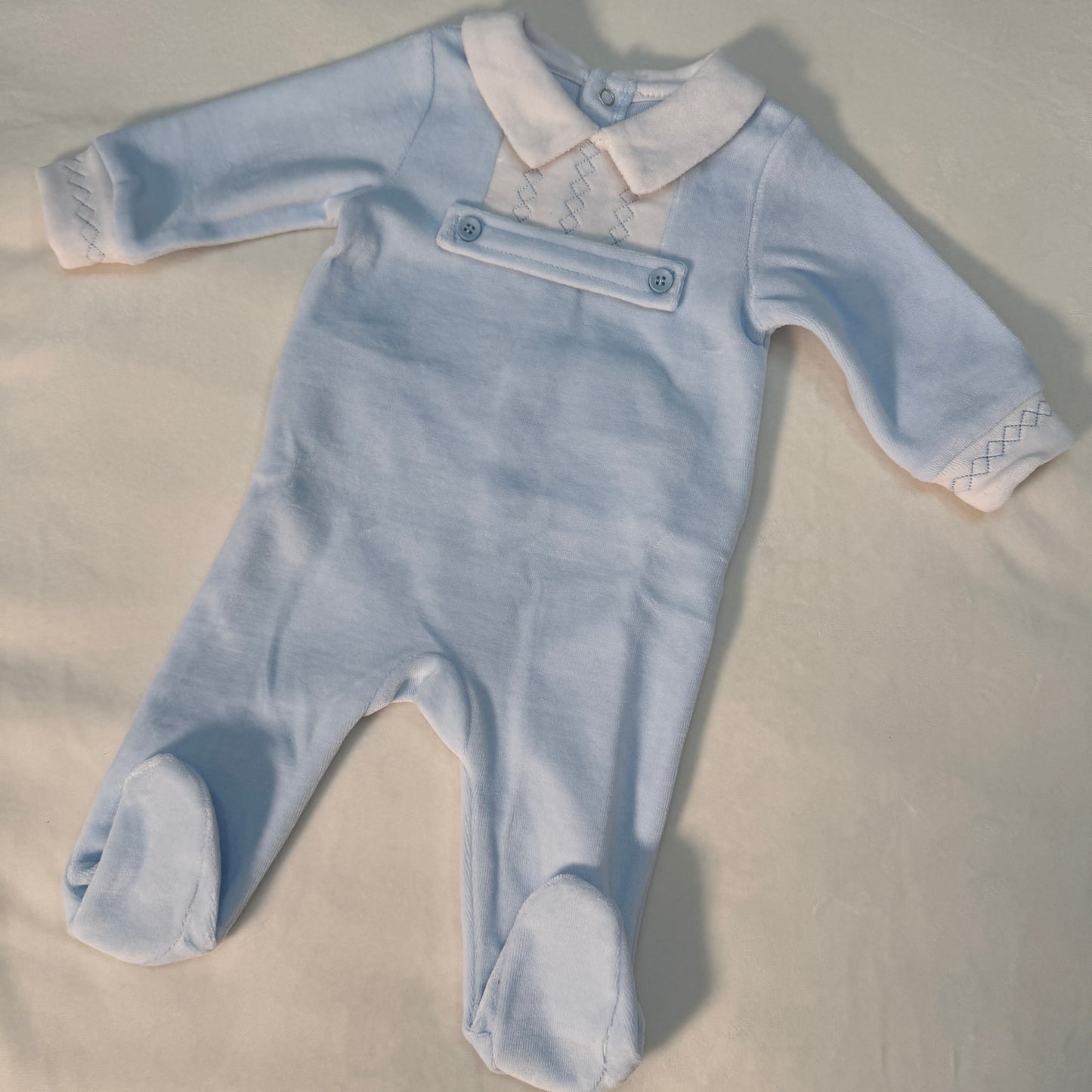 Mameluco de terciopelo azul para bebe